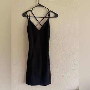 Sparkly black open back dress